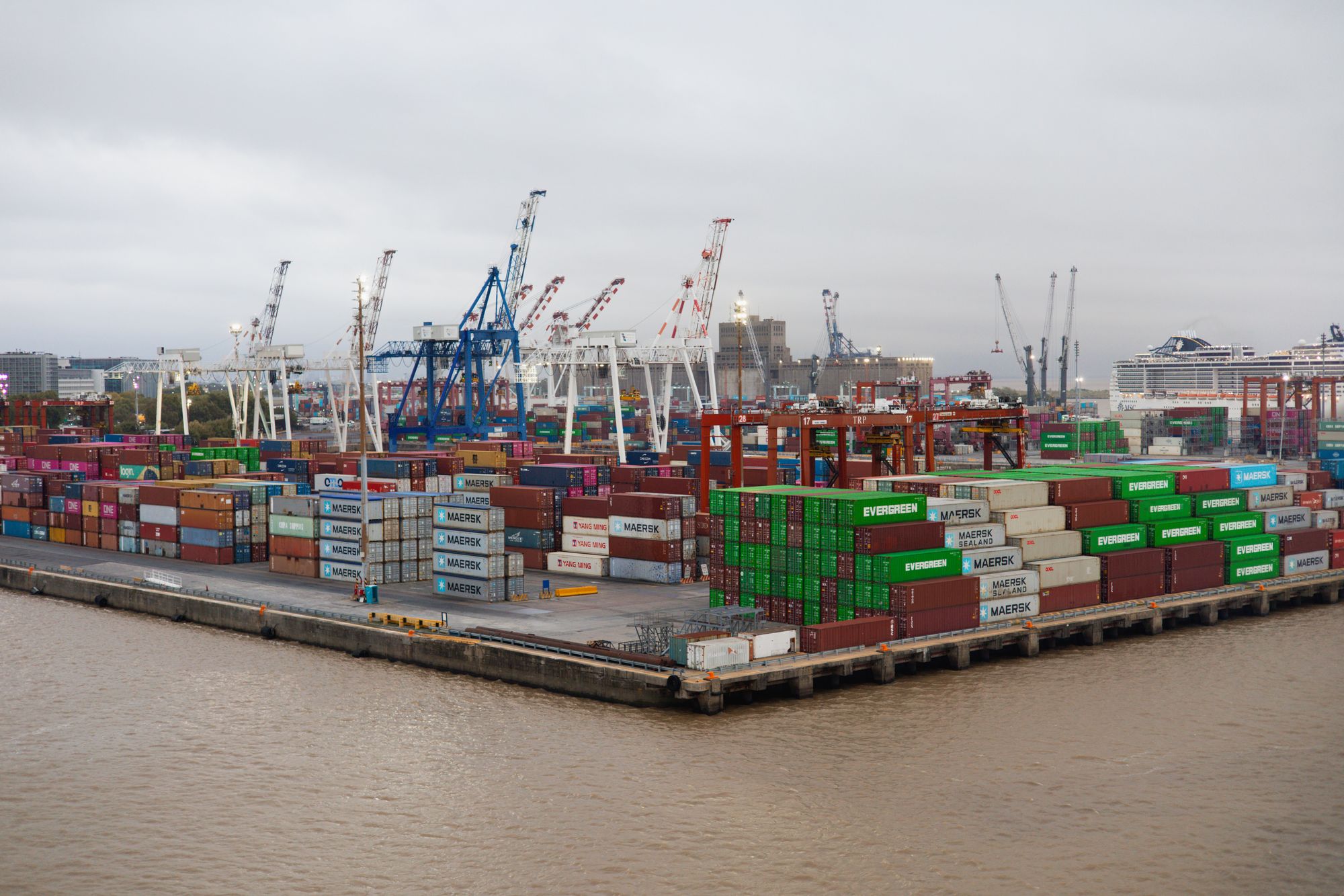 Shipping containers stacked at a commercial port